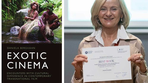 Daniela Bergham holding Janovics award and book cover